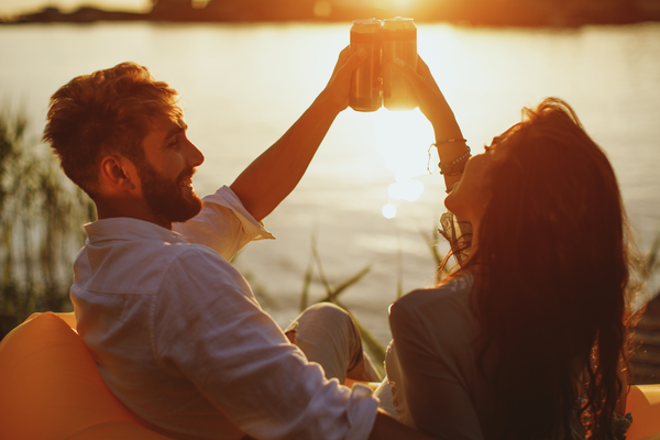 Consumers enjoying canned beverages